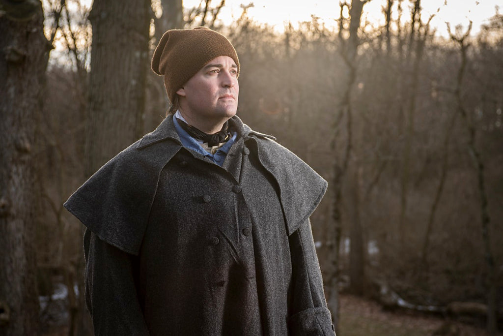 Gray 18th Century Greatcoat being worn in the woods