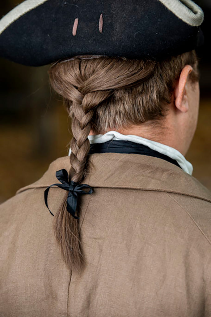 Colonial American Reenactor wearing 18th Century Queue Hairpiece